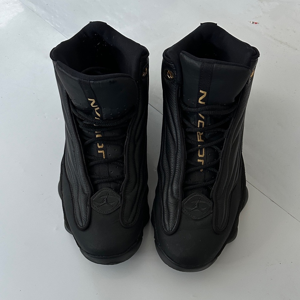 Jordan Black and Gold Sneakers